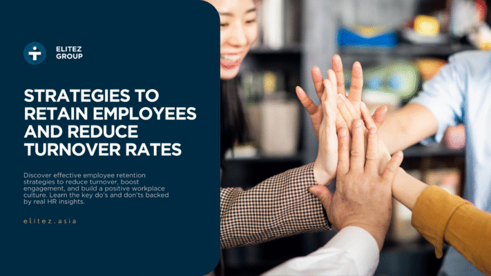 A diverse group of professionals high-fiving in an office, symbolizing team unity and positive workplace culture.