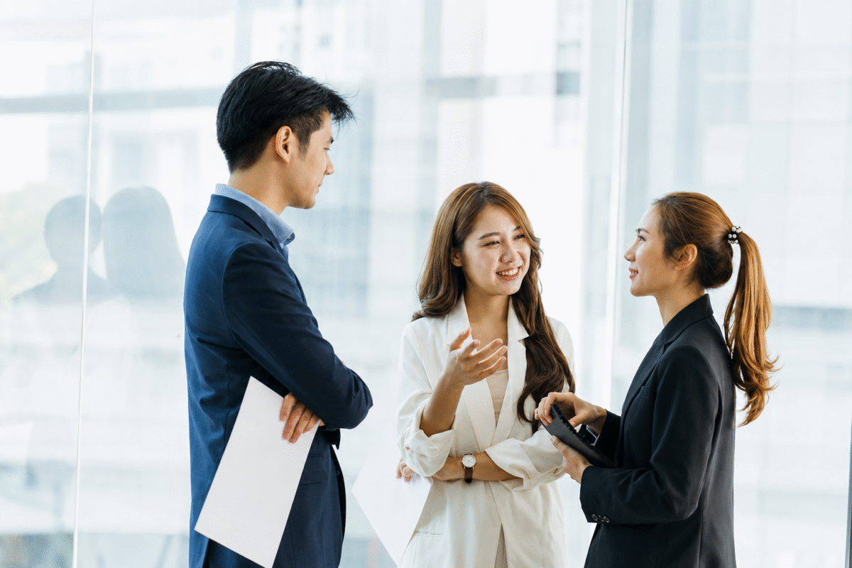 Vietnam team is discussing hiring strategy in the office, representing Vietnam’s 2026 talent crunch and the growing importance of faster recruitment decisions.